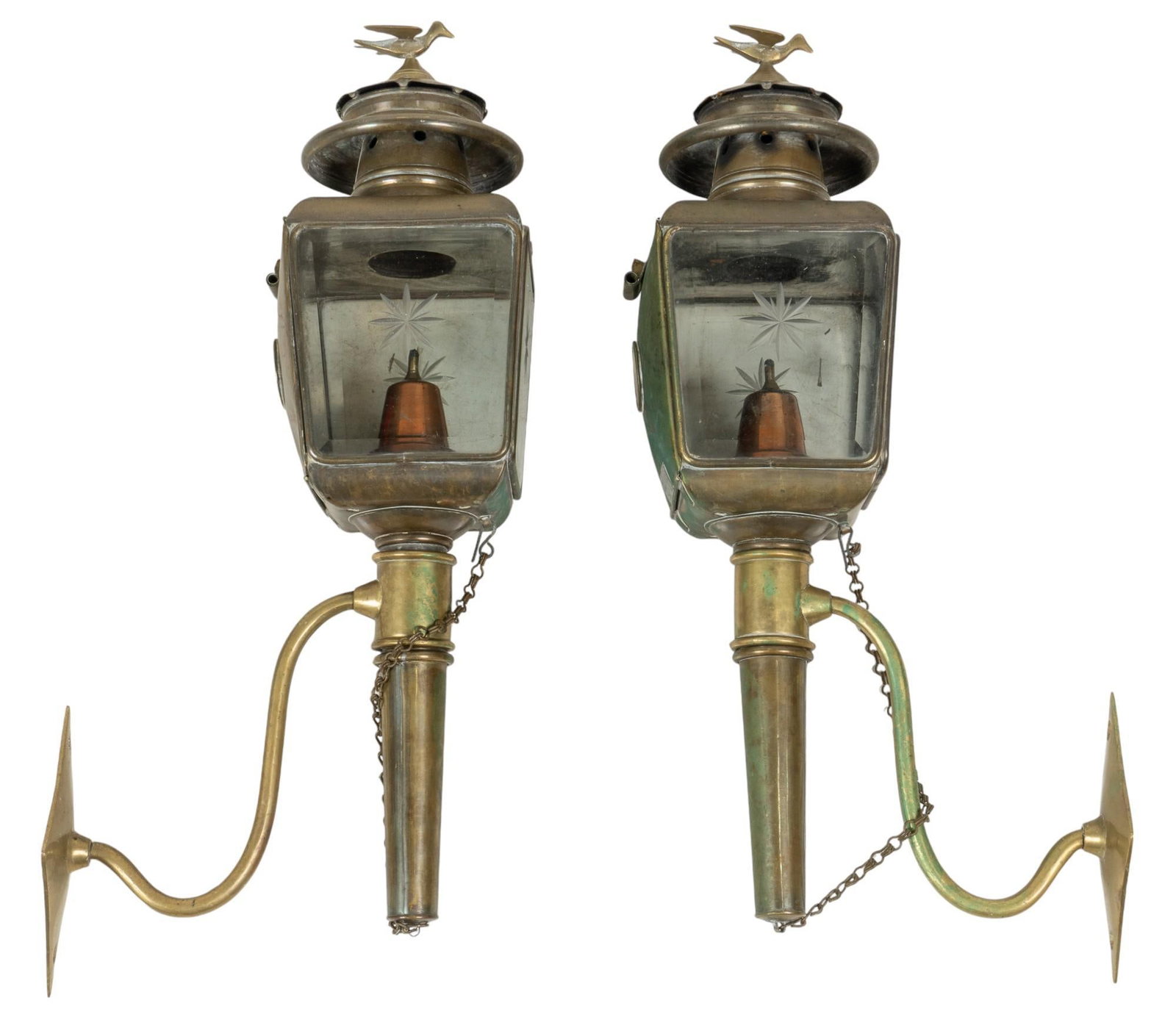 Pair of Carriage Lamps: Pair of carriage oil lamps, with bird details at the top and brass mounts height 21.5 in. x width 5.75 in. x depth 10.5 in. Provenance: Property from the home of a San Antonio, Texas gentleman Shippin