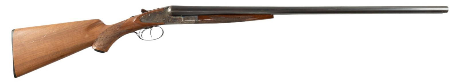 L.C. Smith Field Grade SXS 12 Gauge Shotgun: Serial: FW 71271 Manufacturer: Hunter Arms Co. Inc. / L.C. Smith Model: Field Grade Caliber: 12 Gauge Barrel length: 28 in. OAL: 45 in. LOP: 13.5-14.5 in. Condition: Good; replacement wood
