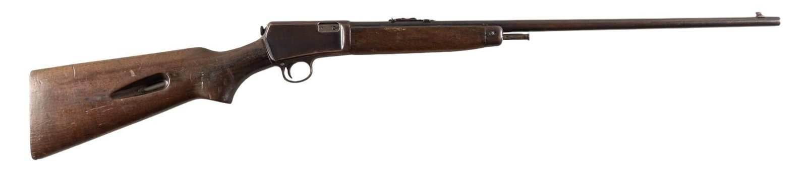 Pre-64 Winchester Model 63 22 LR Semi Auto Rifle: Serial: 155536A Manufacturer: Winchester (c. 1957) Model: 63 Caliber: 22 LR Barrel length: 23 in. OAL: 39.25 in. Condition: Good-Fair; wood stock has dark patina & moderate wear w/ chipping at toe