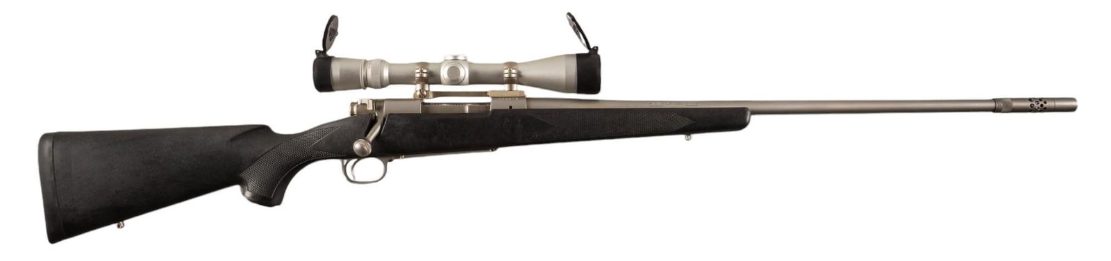 Winchester Model 70 Classic Stainless Boss 7mm Rem Mag Rifle W/ Leupold Scope: Serial: G76973 Manufacturer: Winchester Model: 70 Classic Stainless Boss Caliber: 7mm Rem Mag Barrel length: 26 in. w/ muzzle brake OAL: 47.5 in. Condition: Very Good; synthetic stock has light handli