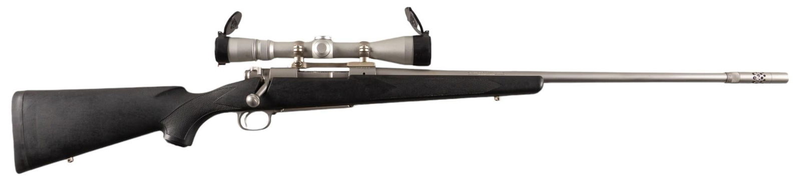 Winchester Model 70 Classic Stainless Boss 7mm Rem Mag Rifle W/ Leupold Scope: Serial: G79260 Manufacturer: Winchester Model: 70 Classic Stainless Boss Caliber: 7mm Rem Mag Barrel length: 26 in. w/ muzzle brake OAL: 47.5 in. Condition: Very Good; synthetic stock has light handli