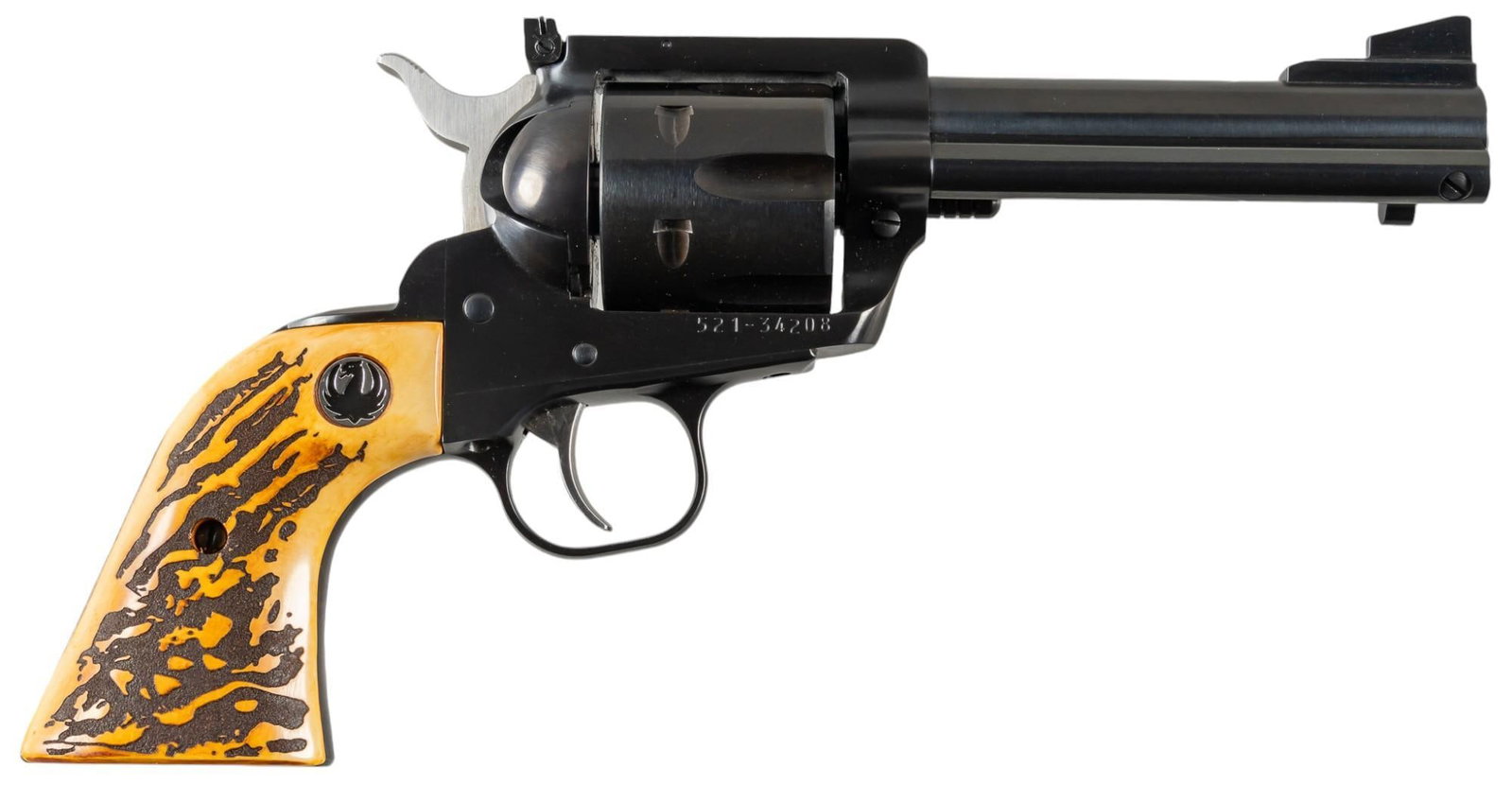 Ruger New Model Blackhawk 44 SPL Revolver: Serial: 521-34208 Manufacturer: Sturm, Ruger & Co. Model: New Model Blackhawk Caliber: 44 SPL Barrel length: 4.5 in. OAL: 10 in. Condition: Good; Magna-Tusk grips have very light handling marks; b