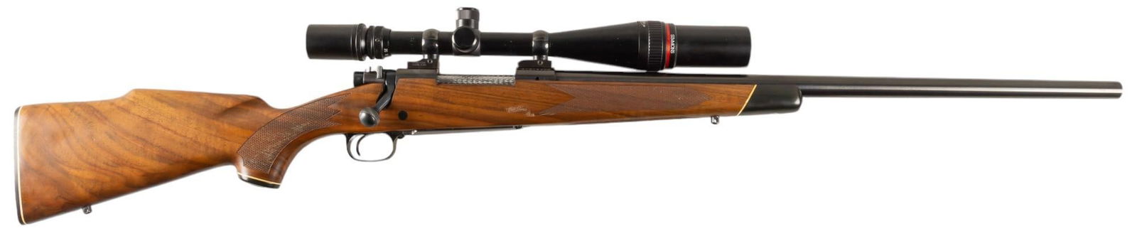 Winchester Model 70 22-250 Rifle W/ Heavy Barrel: Serial: G1318698 Manufacturer: Winchester Model: 70 Caliber: 22-250 Rem Barrel length: 24 in. OAL: 45 in. Condition: Very Good; wood stock has mostly light handling marks; barrel & receiver have