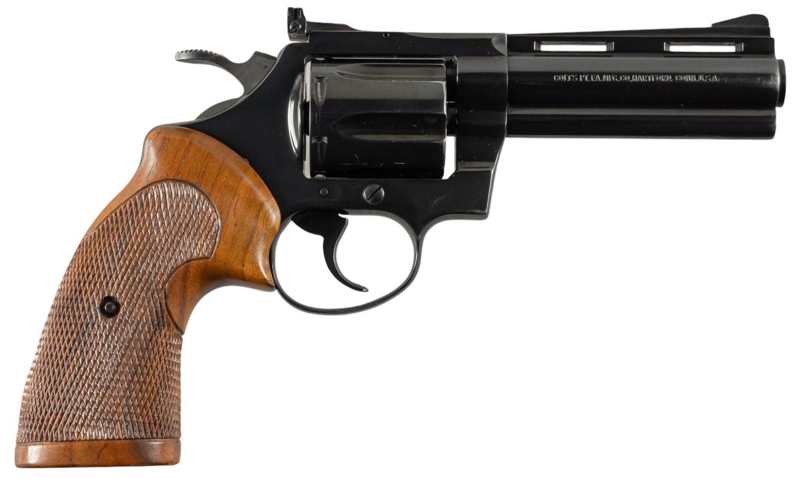 Colt Diamondback 38 SPL Revolver: Serial: R04163 Manufacturer: Colt's PT. F.A. MFG. Co. (1977-1978) Model: Diamondback Caliber: 38 SPL Barrel length: 4 in. OAL: 9 in. Condition: Very good; very light handling marks & mostly ve