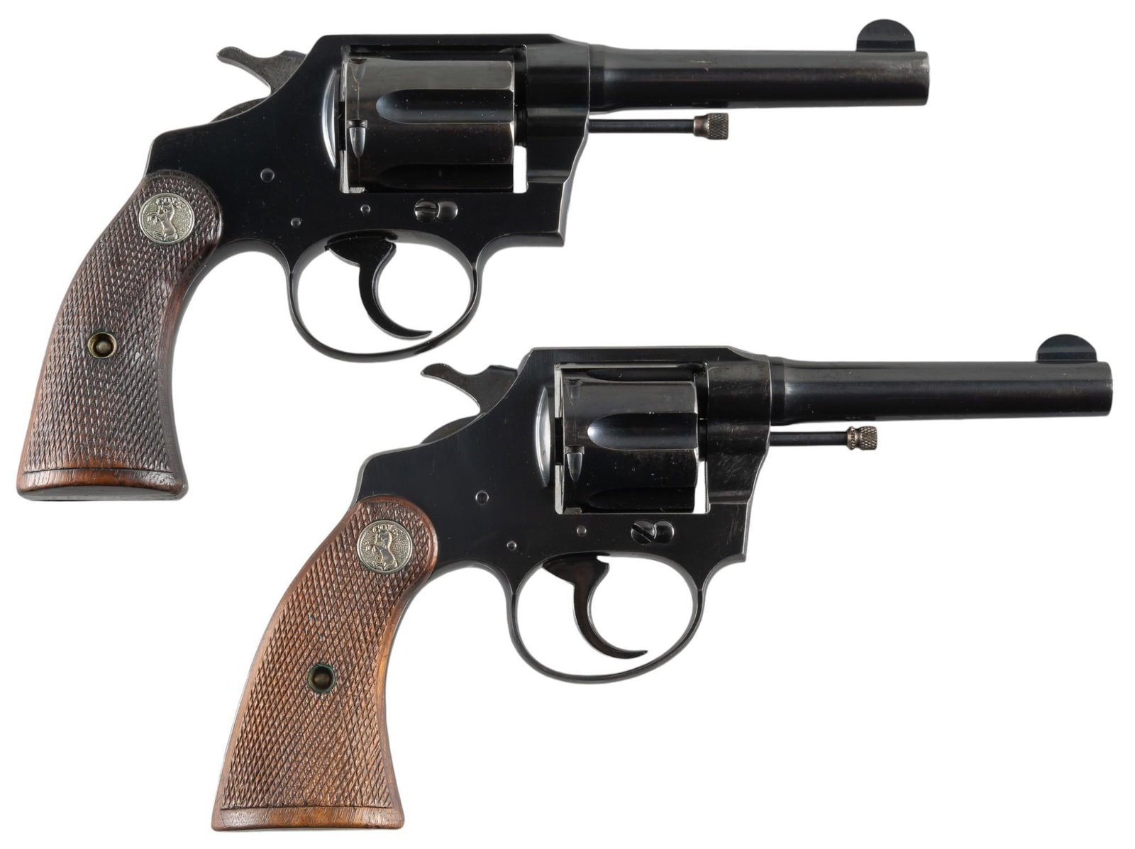 Pair of 1929 Colt Police Positive Revolvers: Serial: (1) 306604; (2) 315580 Manufacturer: Colt's PT. F.A. Mfg. Co. (c. 1929 for both) Model: Police Positive Caliber: (1) 32 New Police; (2) 38 Special Barrel length: 4 in. OAL: 8.5 in. Conditi