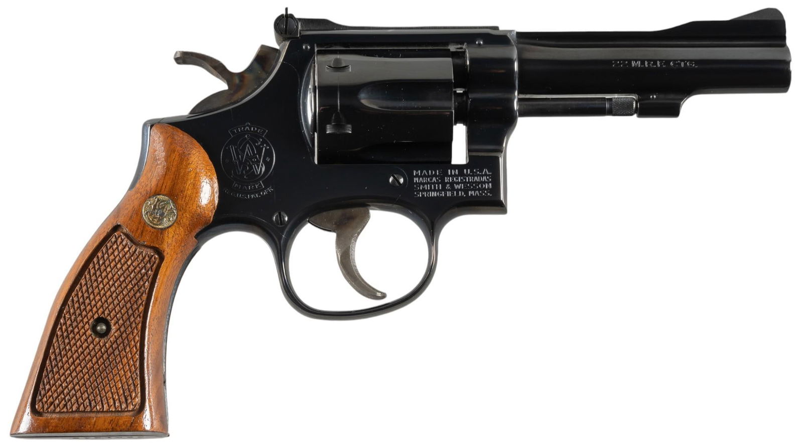 Smith & Wesson Model 48-4 22 WMR Revolver: Serial: 32K1349 Manufacturer: Smith & Wesson Model: 48-4 Caliber: 22 WMR Barrel length: 4 in. OAL: 9 in. Condition: Very Good; grips have very light wear & handling marks including very light