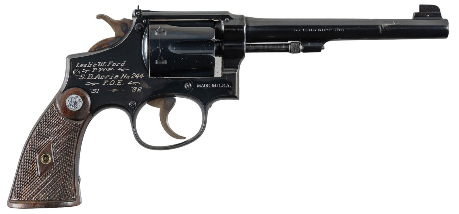 Smith & Wesson K-22 22 LR Revolver: Serial: 639423 Manufacturer: Smith & Wesson Model: K-22 Caliber: 22 LR Barrel length: 6 in. OAL: 11 in. Condition: Good; grips have very light wear & handling marks commensurate with age; bar