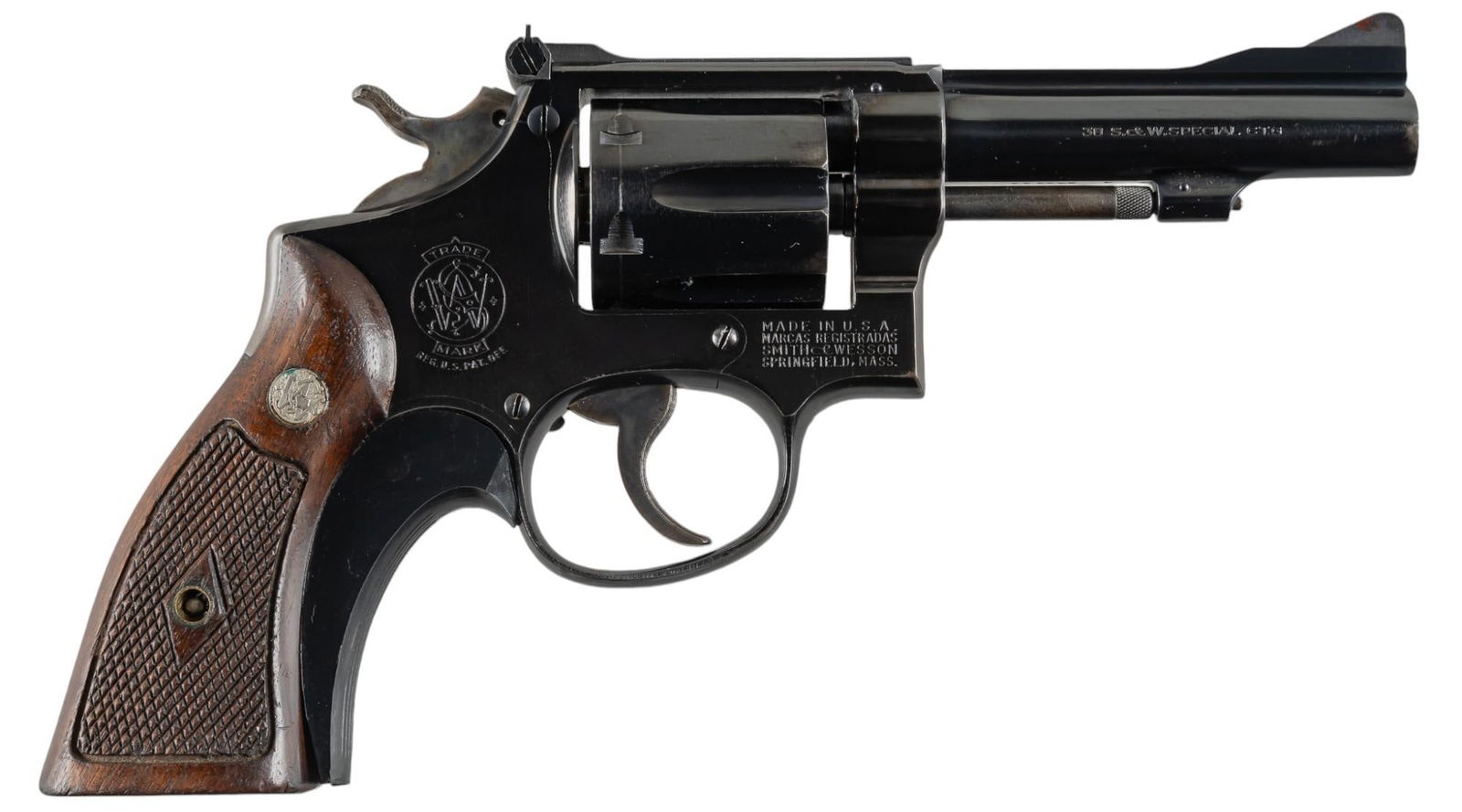Smith & Wesson K-38 Combat Masterpiece 38 SPL Revolver: Serial: K249336 Manufacturer: Smith & Wesson (c. 1949-1957) Model: K-38 Combat Masterpiece Caliber: 38 SPL Barrel length: 4 in. OAL: 9.25 in. Condition: Good; grips have light wear & handling