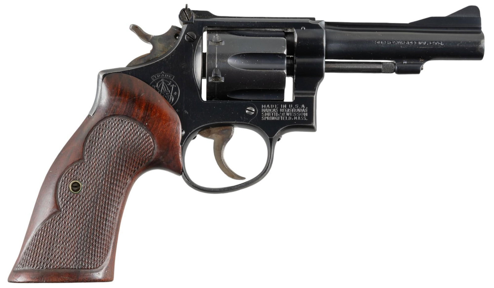 Smith & Wesson K-38 Combat Masterpiece 38 SPL Revolver: Serial: K90388 Manufacturer: Smith & Wesson (c. 1949-1957) Model: K-38 Caliber: 38 SPL Barrel length: 4 in. OAL: 9 in. Condition: Good; grips have light wear & handling marks; barrel & fra