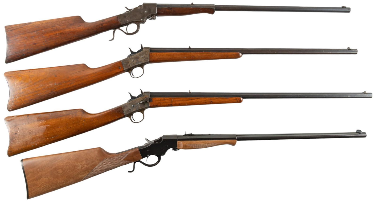 Collection of 4 Rolling Block Rifles: Serial: (1) J214103; (2) 98998; (3) 5057; (4) 0112 Manufacturer: (1 & 2) Remington Arms Co.; (3) J. Stevens; (4) Varner Sporting Arms Model: (1 & 2) No. 4; (3) Favorite; (4) Favorite Caliber: