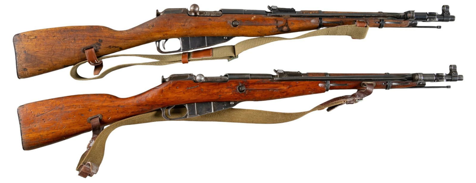 Pair of Chinese Factory 26 Type 53 7.62x54R Carbines: Serial: (1) T53025966; (2) T53018364 Manufacturer: Factory 26-China / CAI (1) c. 1954; (2) c. 1956 Model: Type 53 Caliber: 7.62x54R Barrel length: 20.5 in. OAL: 40.25 in. Condition: (1) Fair; wood sto