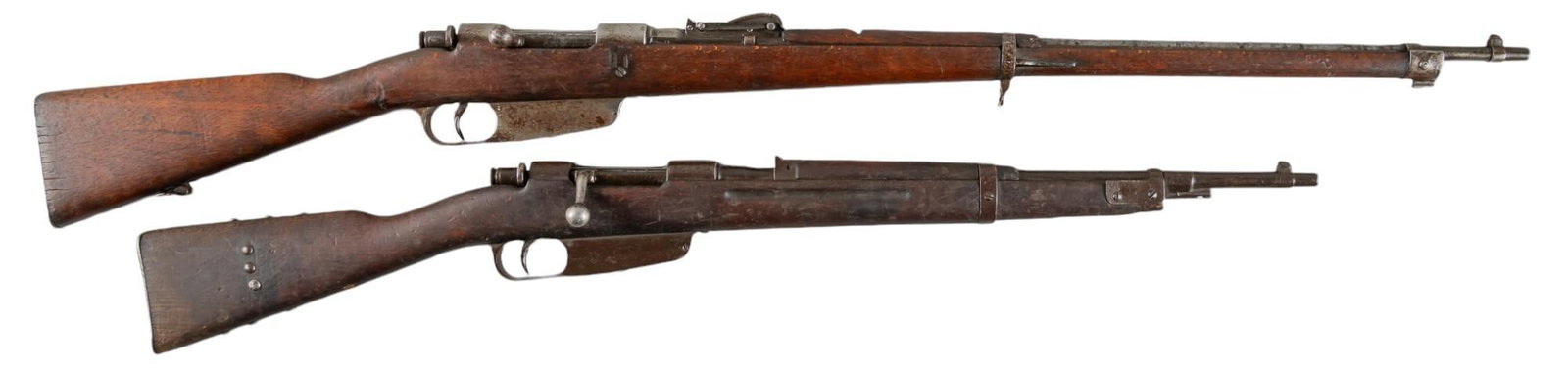 Pair of Italian Carcanos: M1891 & M1891/38 Carbine: Serial: (1) 216575; (2) 1820 Manufacturer: Terni, Italy (1) c. 1935; (2) IO Inc. c. 1898; reworked 1939 Model: (1) M1891 Carcano; (2) M1891/38 Carcano Carbine Caliber: (1) 6.5 Carcano; (2) 7.35 Carcan