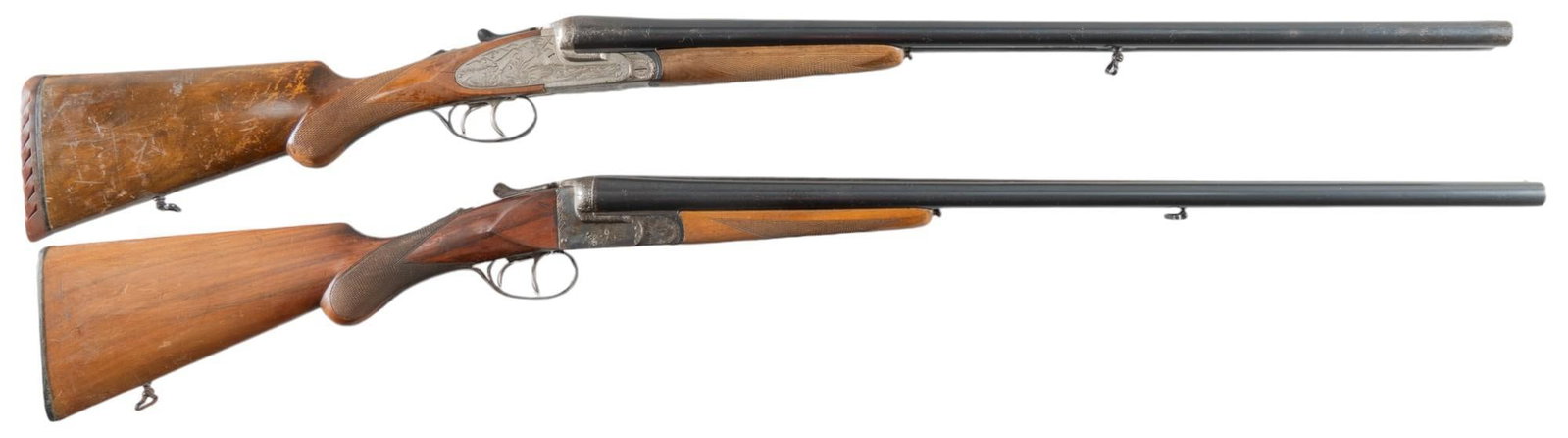Pair of Spanish 12 Gauge SXS Shotguns: Serial: (1) 124957Z; (2) 118282 Manufacturer: (1) Aramberri-Spain / CAI; (2) Eibar-Spain / CAI Model: SXS Caliber: 12 Gauge Barrel length: (1) 28 in.; (2) 27.5 in. OAL: (1) 44 in.; (2) 44 in. Conditio