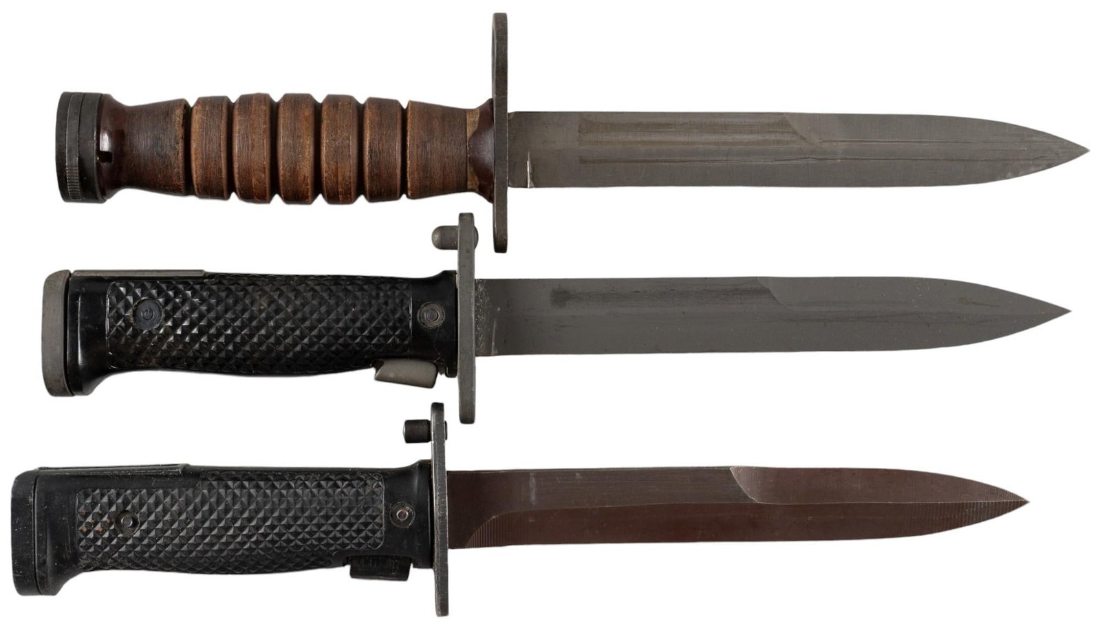 Collection of 3 US M5 & M4 Bayonets: Manufacturer: (1) HMAK-Danish; (2 & 3) Imperial Model: (1) Danish M5A1; (2) M5; (3) M4 Blade Length: (1 & 3) 6.75 in.; (2) 6.875 in. OAL: (1-3) 12.25 in. w/ scabbards Condition: (1) moderate w