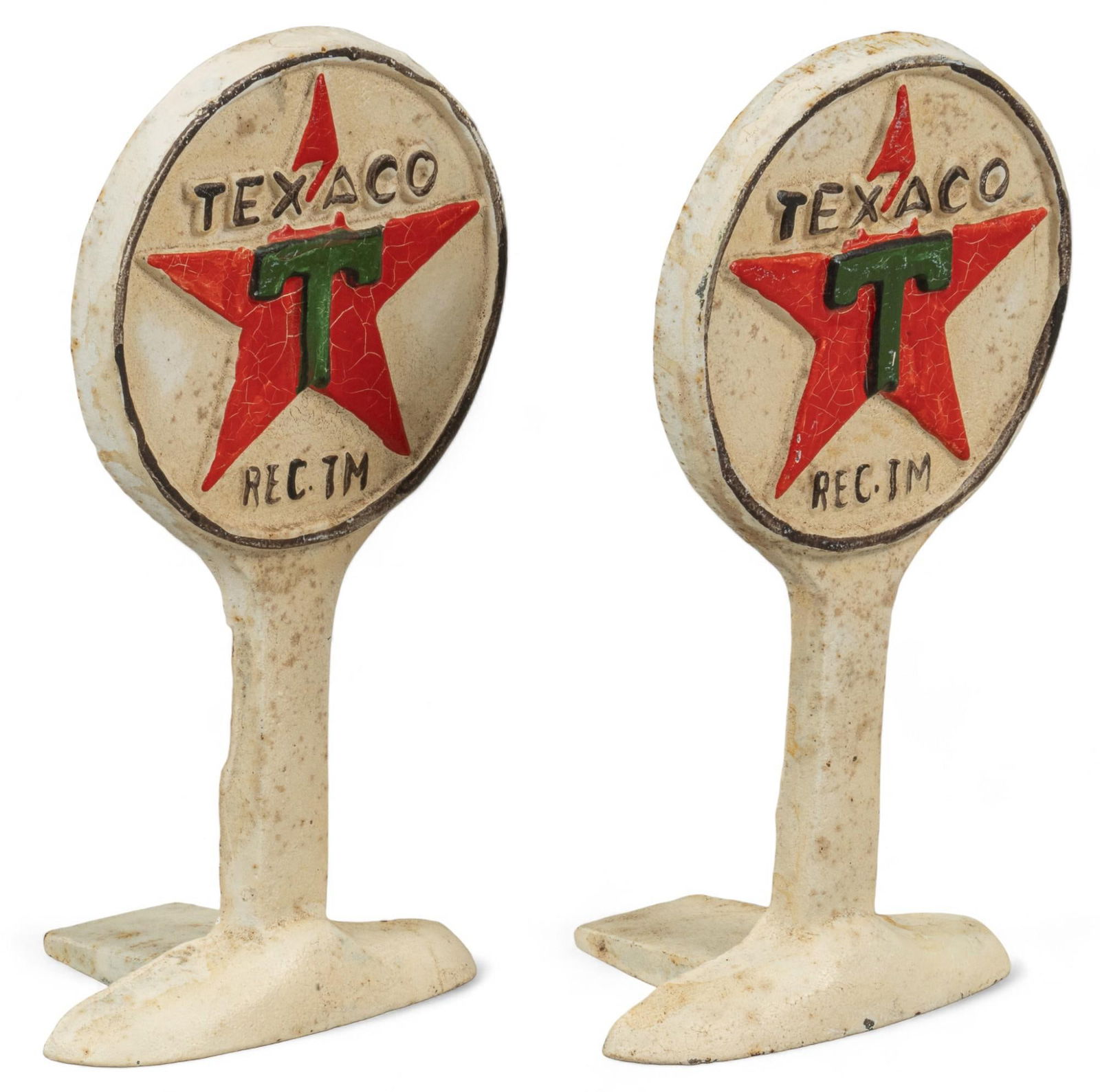 Pair of Texaco Doorstops: Pair of painted cast iron Texaco doorstops height 10 in. x width 5 in. x depth 3.5 in. Provenance: Property from the collection of a San Antonio, Texas gentleman Shipping available for this lot thr
