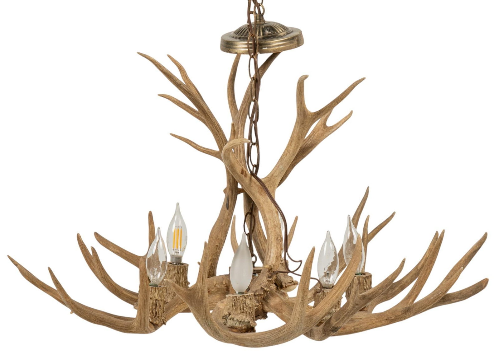 Antler Chandelier: Antler chandelier featuring hanging fixture and six light bulb inserts with faux bois bases height 17 in. x width 28 in. x 28 in. Provenance: Property from the collection of a Nixon, Texas gentleman S