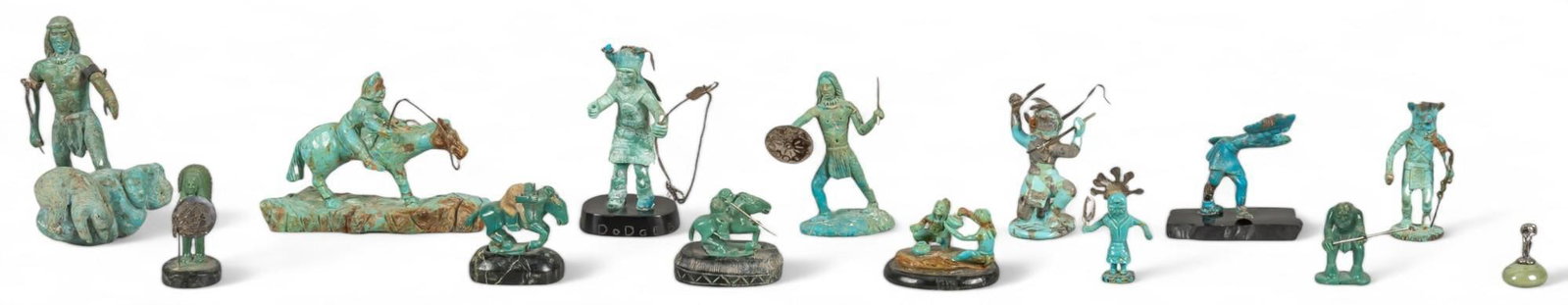 Tom Freeland, Collection of Turquoise Fetishes: Tom Freeland, collection of turquoise fetishes, Native American carved turquoise figurines in various poses height 3.5 in. x width 3 in. x depth 2.25 in. Shipping available for this lot through our pa