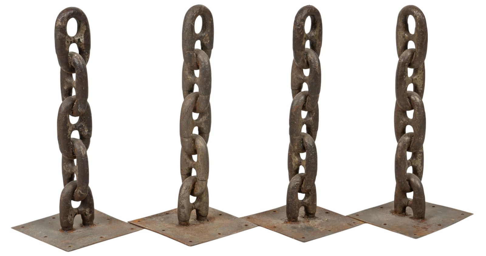 Set of (4) Iron Chain Sculptures: Set of four cast iron chain link sculptures, with holes to mount to ground height 28 in. x width 12 in. x depth 12 in. Provenance: Property from the collection of a Hunt, Texas family Shipping avai