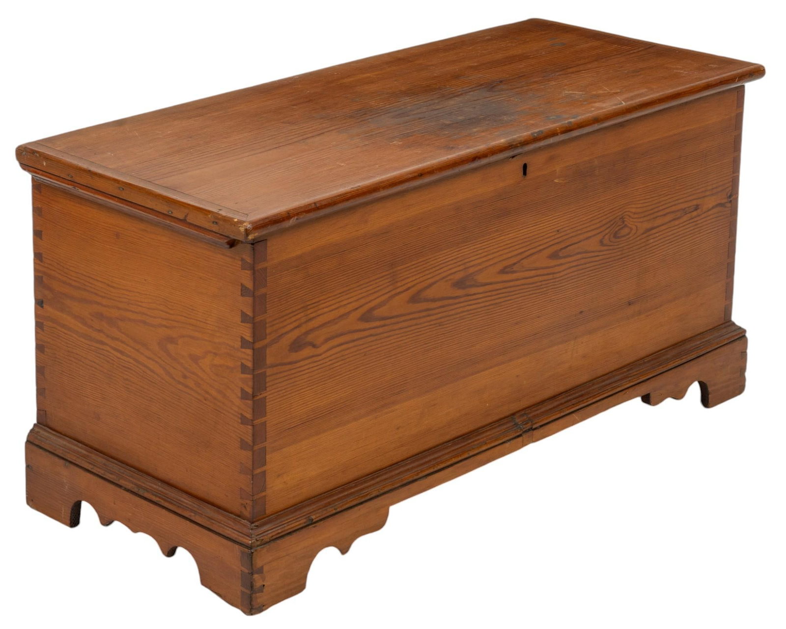 Wooden Chest: Wooden chest supported on decorative legs height 18 in. x width 36.5 in. x depth 15.5 in. Provenance: Property from the home of a San Antonio, Texas lady Shipping available for this lot through our pa