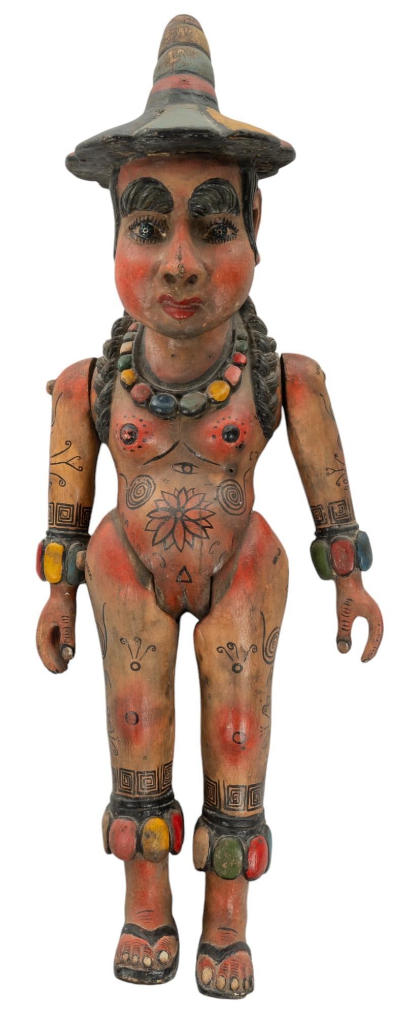 Rare Vintage Mexican Carved Wood Processional Figure: Mexican carved wood sculpture of an indigenous female, used as a processional €œpole puppet€? during Mexican festivals, the polychrome decorated figure, articulated arms and legs and a hole