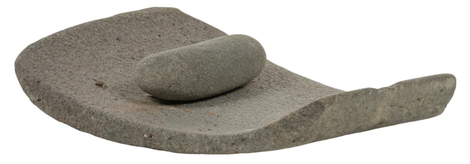 Mexican Stone Metate: Mexican metate, stone, with rock grinding stone height 3 in. x width 17 in. x depth 12 in. Provenance: Property from the collection of an Austin, Texas gentleman Shipping available for this lot throug