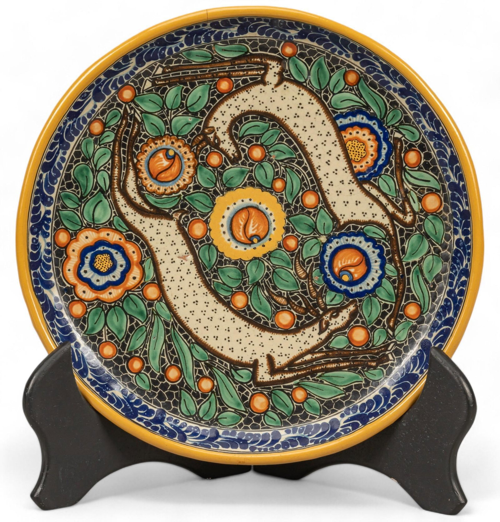 Vintage Ceramic Artistica Talavera Charger: Vintage Ceramic Artistica Talavera (Puebla, Mexico) charger, with hand-painted polychrome flower and berries, central deer motifs, signed "Puebla. Mex." above stylized initials "CA" he
