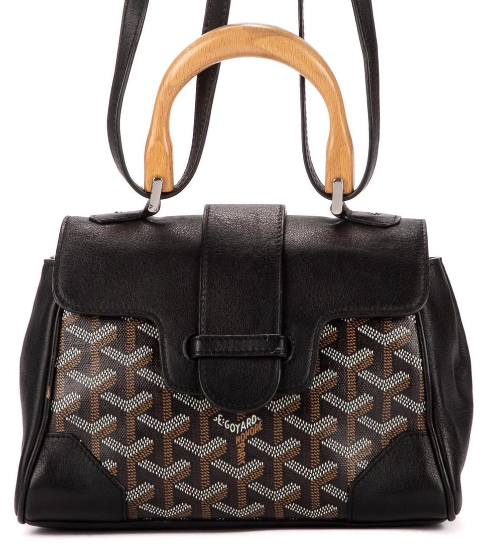 Goyard Saigon: Goyard Saigon handbag of black calfskin leather, with wooden handle, and silver hardware, includes removable black leather strap 8 in. x 6 in. x 3 in. Condition AB; very good condition, shows regul