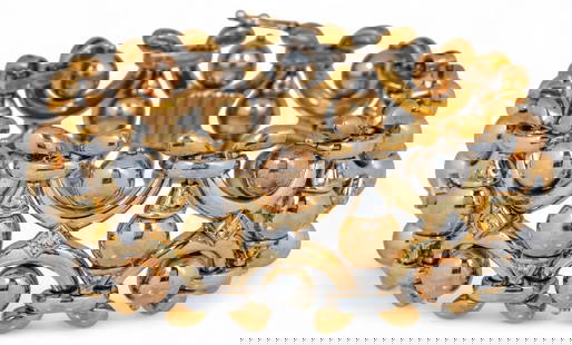 18K Diamond Chain Bracelet: 18K gold diamond chain bracelet featuring interlocking chain motif with inlaid diamonds between interlocked features, marked "750" Circumference: 8.5 in. Total weight: 86.1 g 