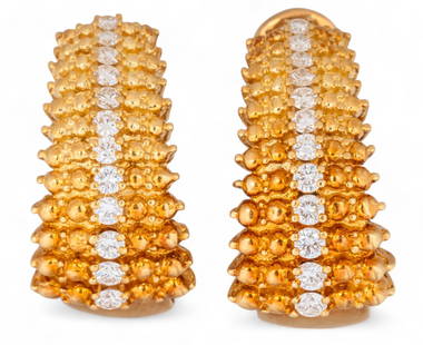 Elan 18K Diamond Hoop Earrings: Elan 18K gold diamond hoop earrings featuring row of twelve round brilliant cut diamonds (approx. 0.6 ctw) on each earring, French clip backs, marked "Elan 750" Length: 1 in. Total