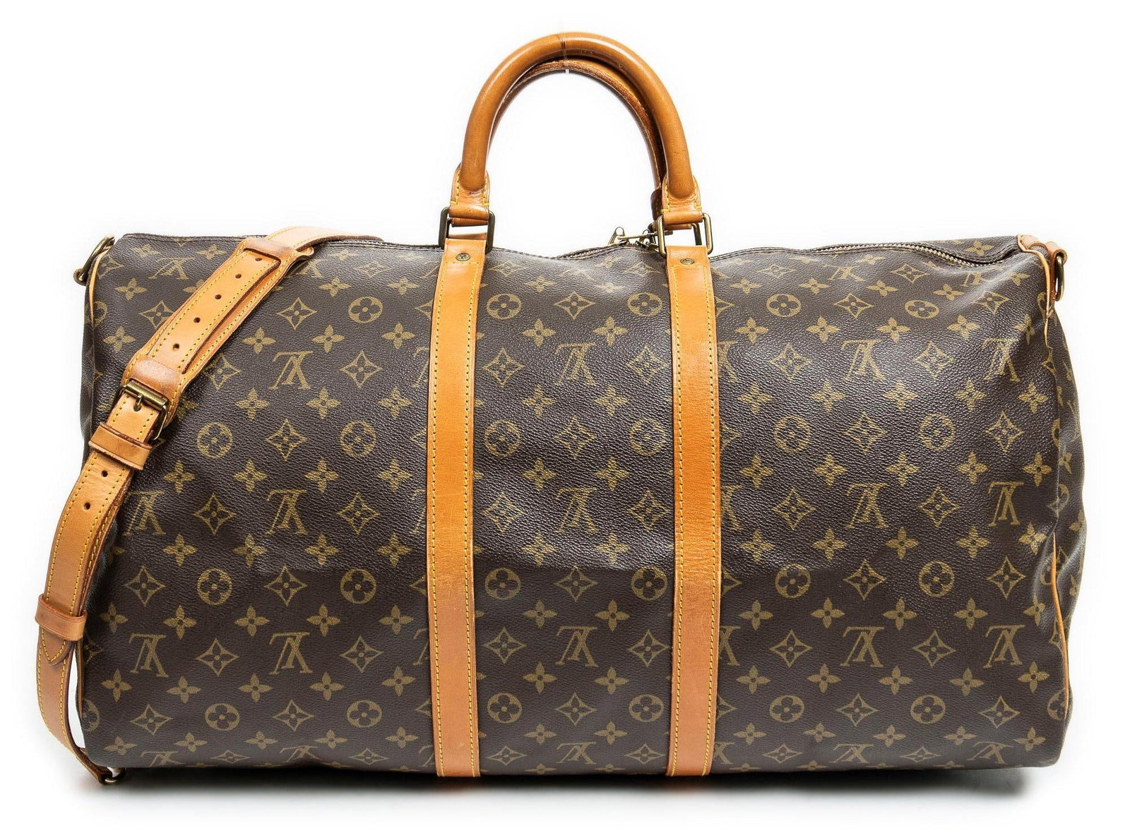 Louis Vuitton (FRA) Keepall Bandouliere: Louis Vuitton Keepall Bandouliere travel bag of coated brown monogram canvas with vachetta handles and gold brass hardware; marked VI873 (Mar 1987), includes shoulder strap 23 in. x 11 in. x 10 in. Co