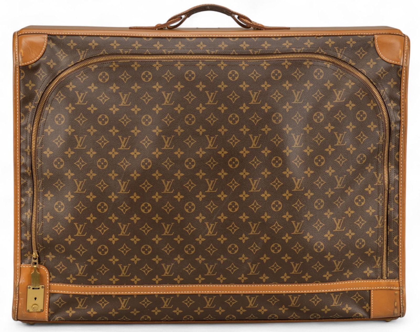 Vintage Louis Vuitton Suitcase: Louis Vuitton suitcase of brown monogram canvas, with khaki leather handle and corners, golden brass hardware, monogrammed brass plate, does not include key height 22 in. x width 29 in. x depth 9.5 in
