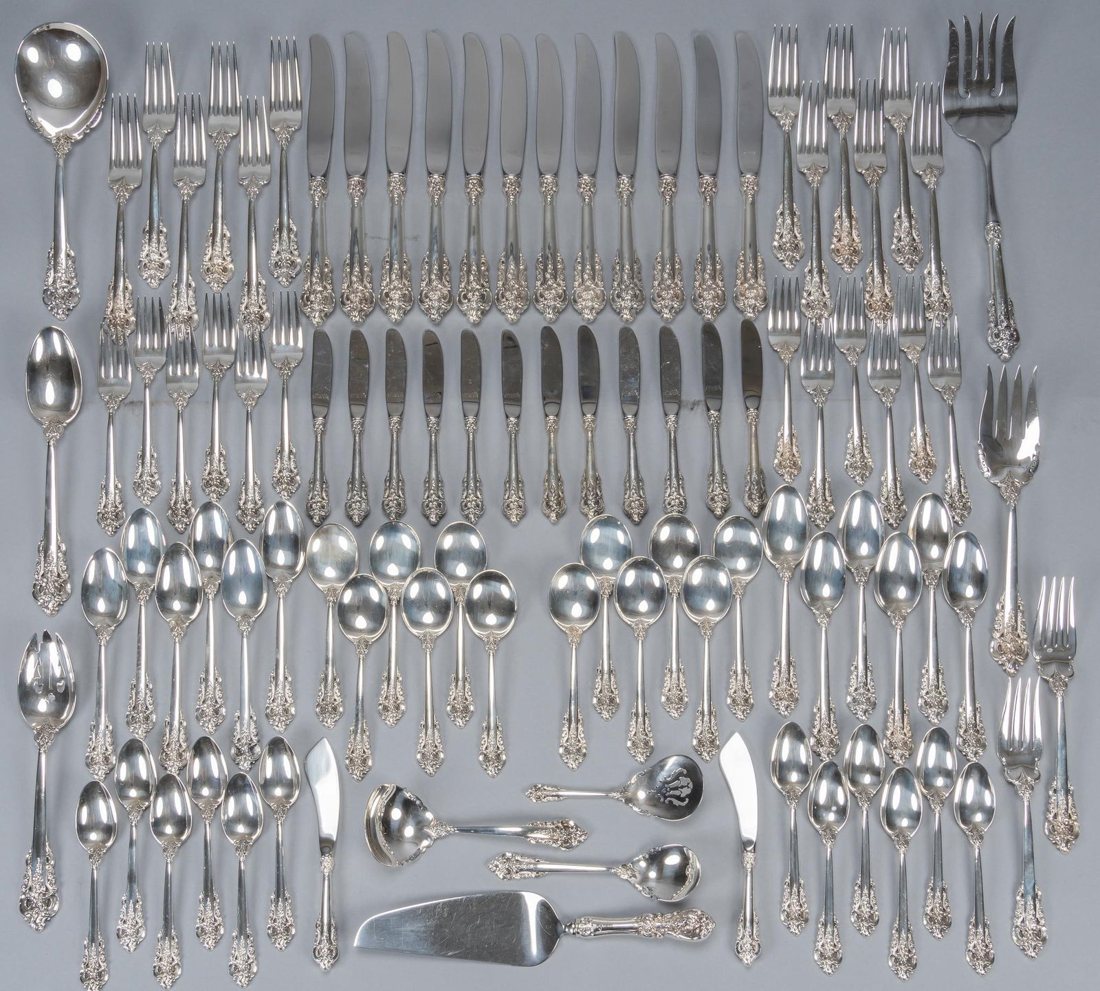 "Grande Baroque" By Wallace Silversmiths Sterling Silver Flatware set: "Grand Baroque" by Wallace Silversmiths sterling silver flatware set of 97 pc, service for 12, no monogram or removal Includes: 12 dinner knives 9 3/4 in. 12 dinner forks 8 in. 12 salad fork