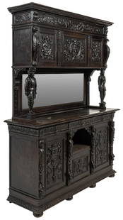 Renaissance Revival Style Hutch Buffet: Renaissance Revival style hutch buffet featuring carved crown above three cabinet doors that open to interior storage, each having Green Man motif carved into facade, and metal escutcheon, supported