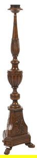 Wooden Torchiere Candle Holder: Torchiere candle holder/altar stick with turned and graduated baluster with twisted, fluted and beaded accents, on tripod base with foliage motif carvings over paw feet height 53.5 in. x width 14