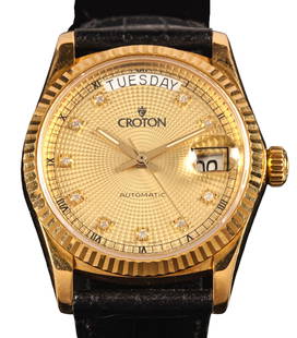 18K Croton Watch: 18K Croton watch, 36 mm, automatic movement, black calfskin leather band Circumference: 8.75 in. Total weight: 62.9 g Provenance: Property from the collection of a San Antonio, Texas
