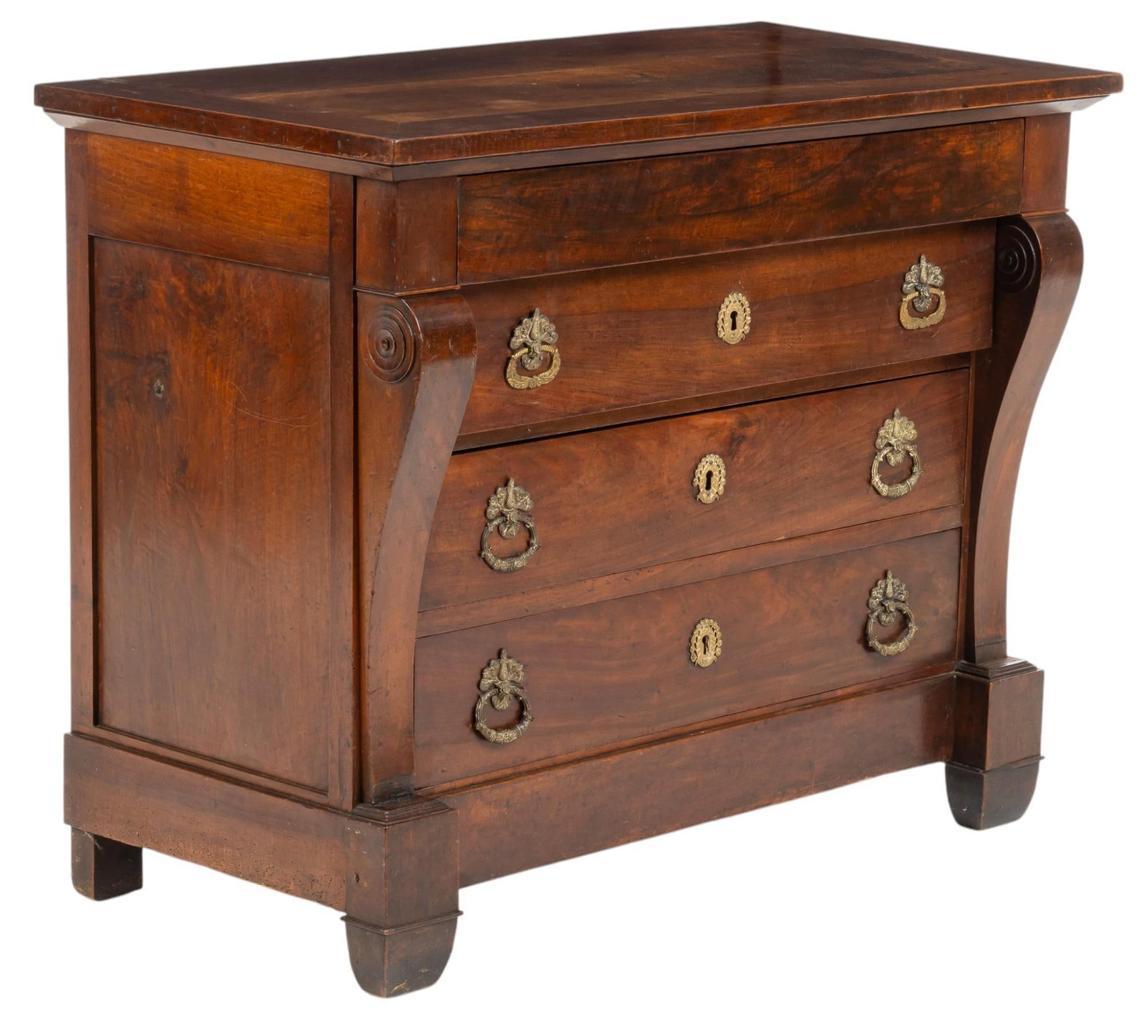 French Empire Style Dresser: French Empire style dresser, having oversize top above frieze drawer, with stack of three flush drawers with gold-toned metal pulls and escutcheon, flanked by scrolled pilaster accents, supported on s