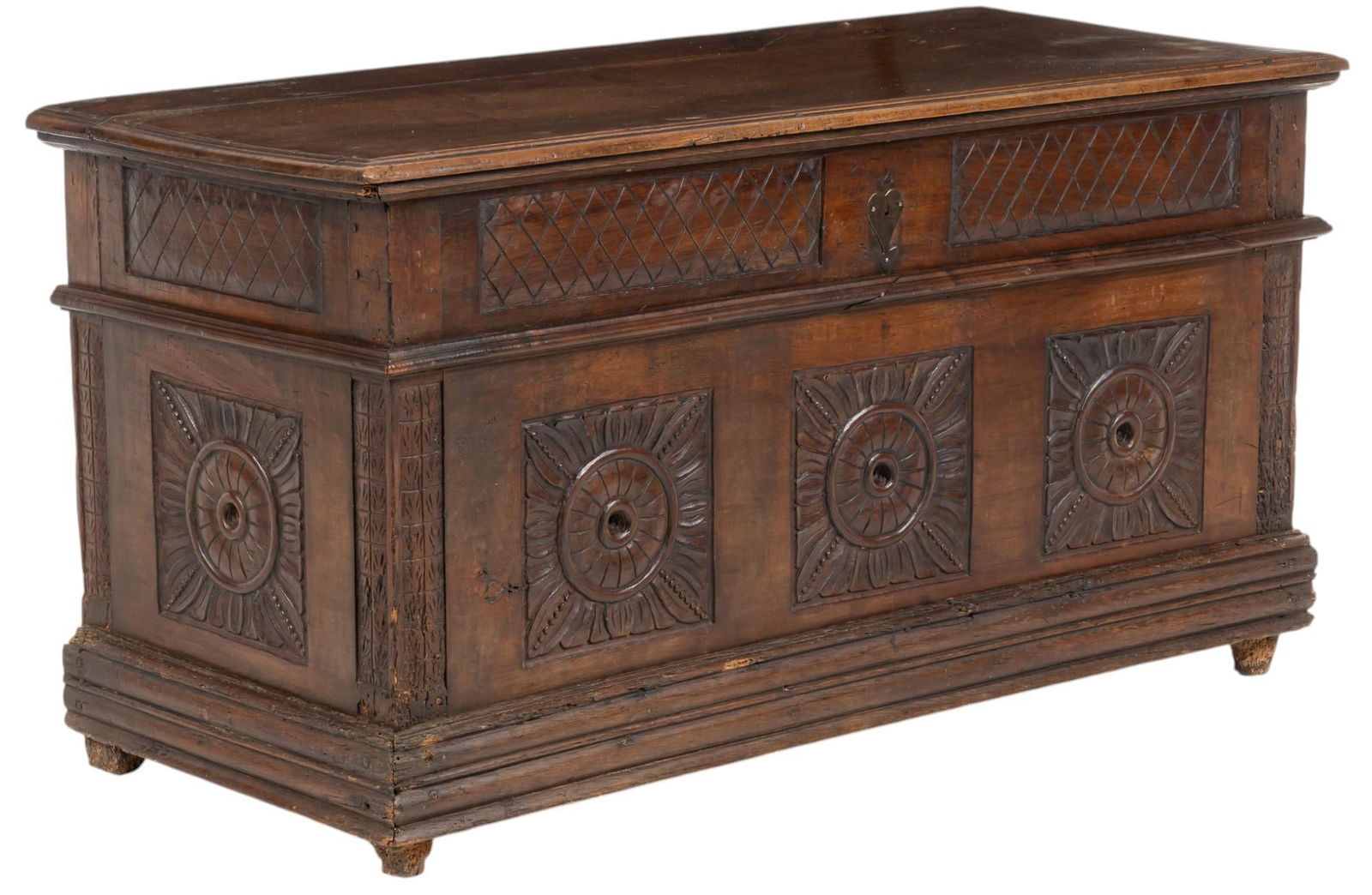 Medieval Style Coffer: Medieval style coffer chest having hinged lid that opens to interior storage, with heavily carved facade, rising on block legs, circa 19th century height 28 in. x width 53 in. x depth 22.5 in.