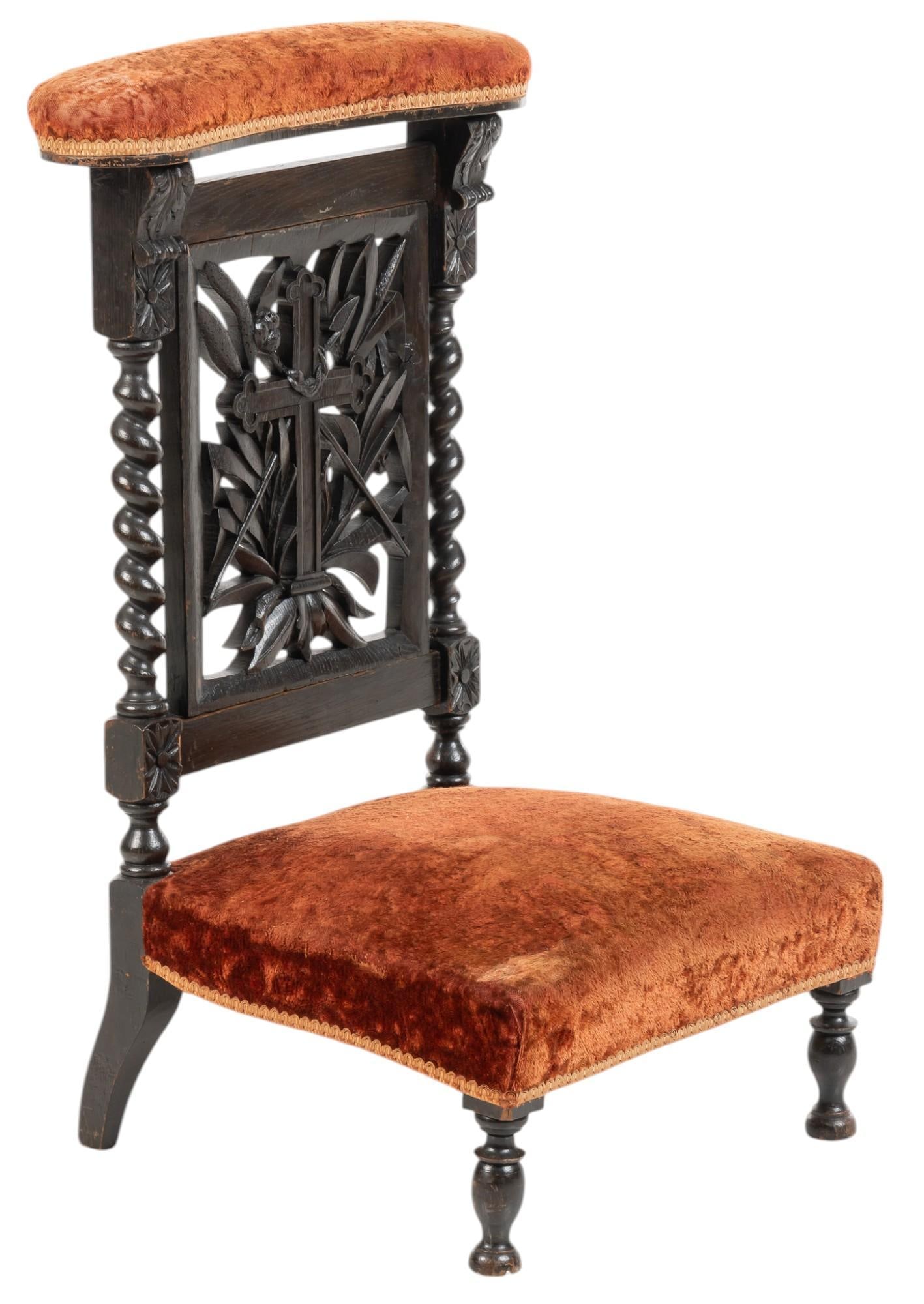 Napoleon III Style Prayer Deaux: Napoleon III prayer chair with dark wooden frame with carved details including corbels with acanthus leafs, splat with crucifix framed by carved botanical motifs, and barely twist supports, with seat 