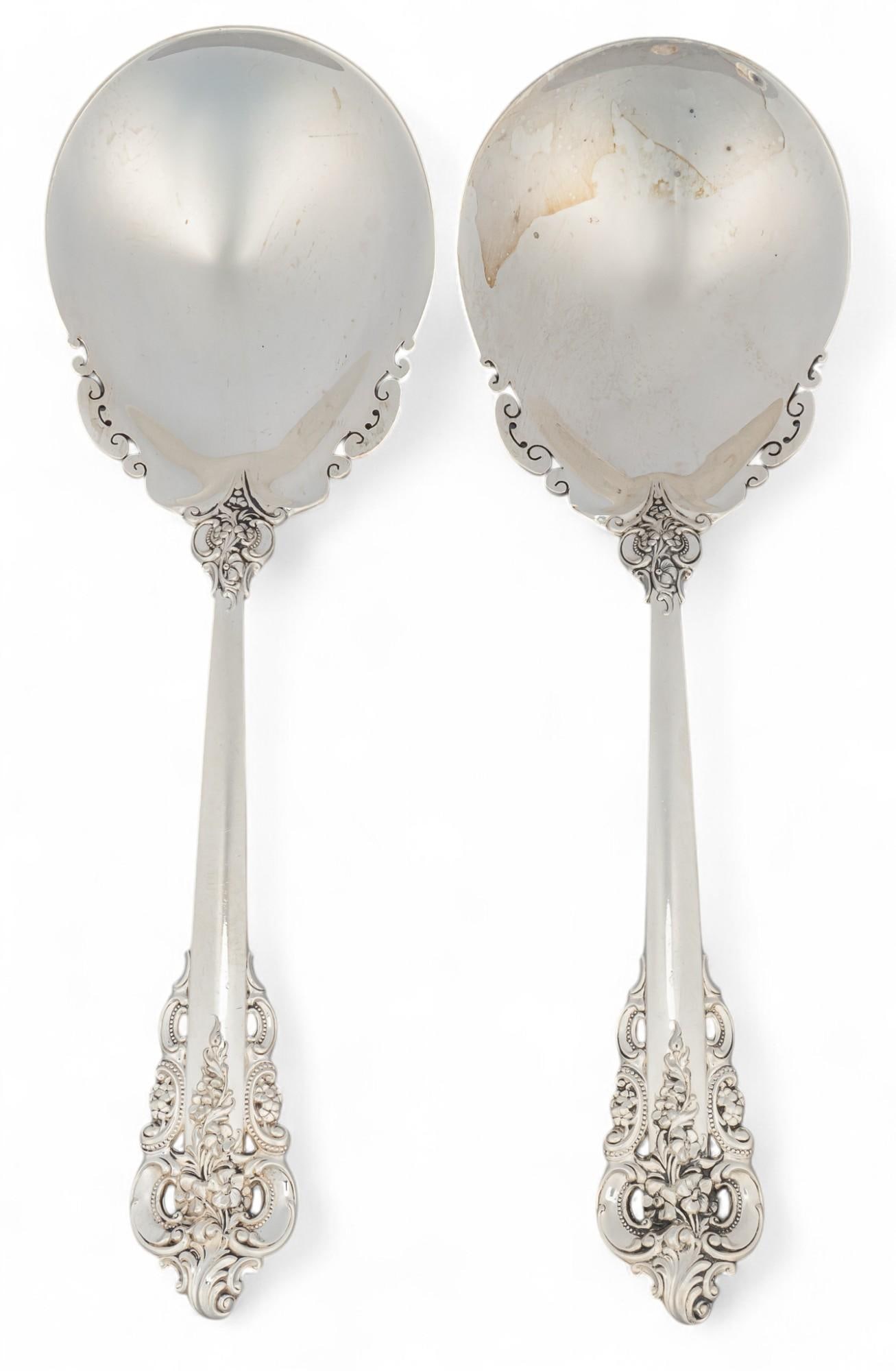 (2) "Grande Baroque" By Wallace Silversmiths Sterling Silver Serving Spoons: Two "Grand Baroque" by Wallace Silversmiths sterling silver serving spoons, marked "Wallace Sterling" Total weight: 9.39 ozt