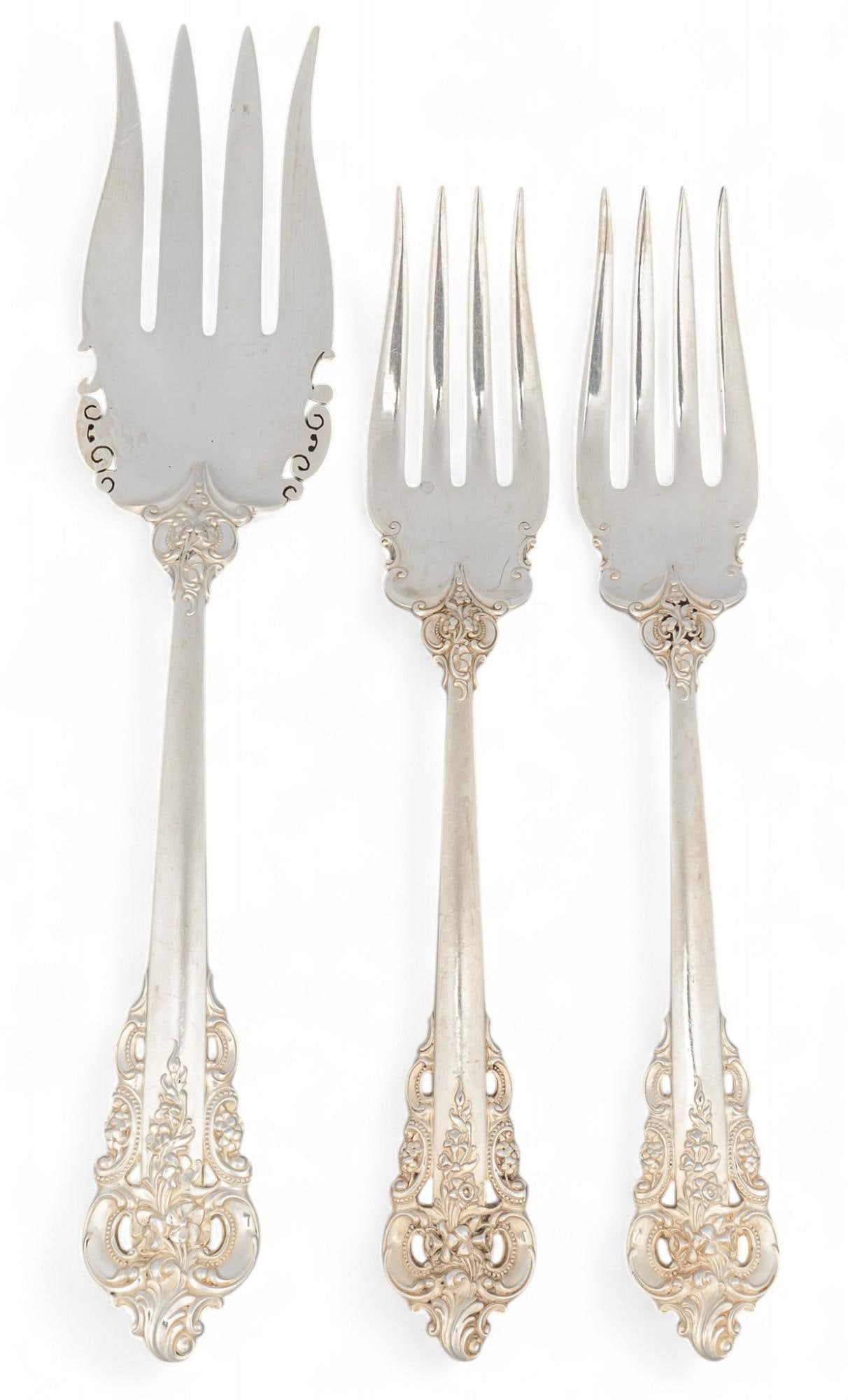 (3) "Grande Baroque" By Wallace Silversmiths Sterling Silver Serving Forks: Three "Grand Baroque" by Wallace Silversmiths sterling silver serving forks, two small forks, one large fork, marked "Wallace Sterling" Total weight: 9.64 ozt