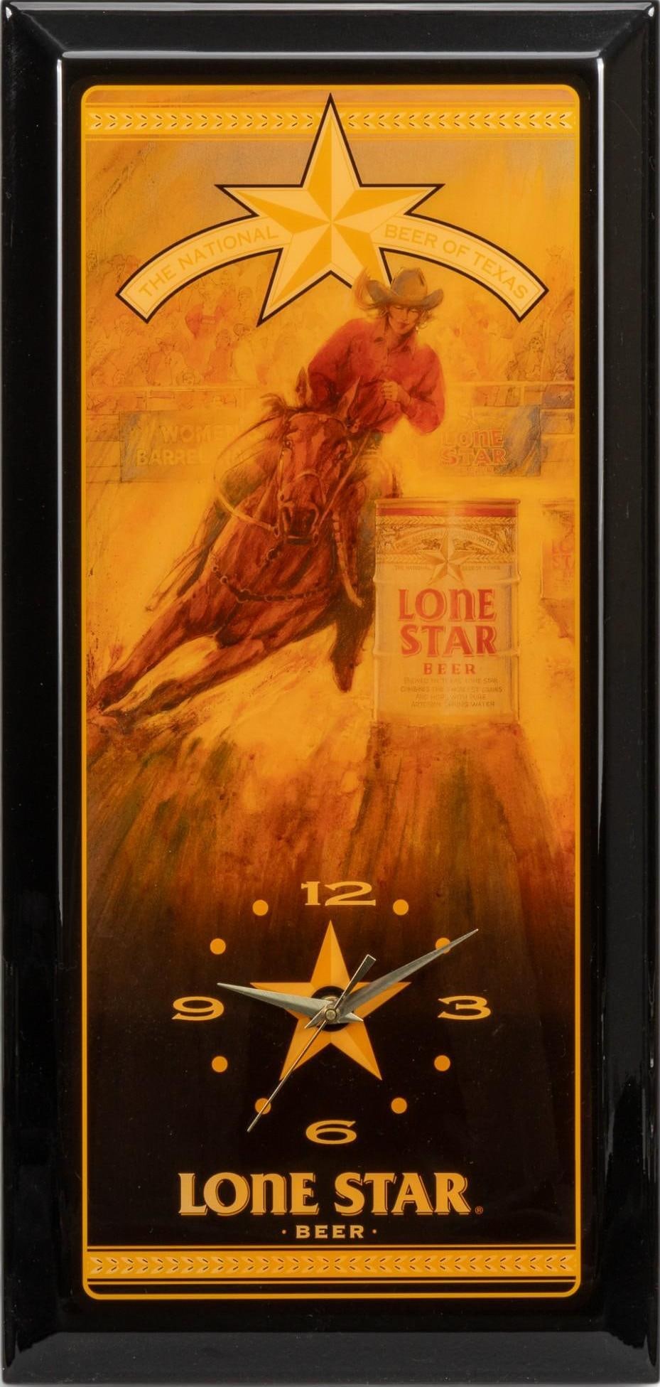 Lone Star Beer Rodeo Cowboy Wall Clock: Lone Star Beer electric wall clock, featuring "The National Beer of Texas" message above depicted scene of rodeo cowboy on horseback, in working condition, circa 1990s height 22.75 in. x widt