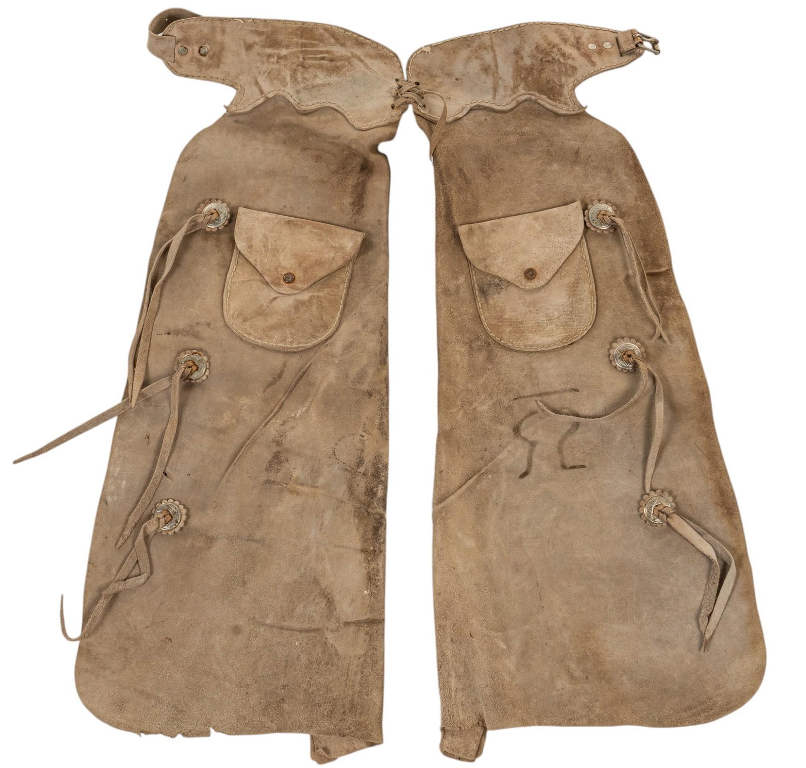 Pair of Vintage Mexican Shot Gun Chaps: Pair of vintage Mexican shotgun leather chaps, with pockets, circa 1940s length 40 in. x width 28 in. Provenance: Property from a Bulverde, Texas collection