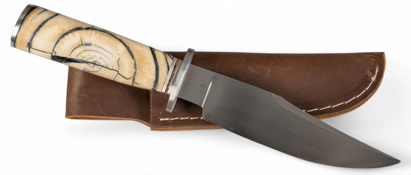 Custom Henry Torres MS Cross-Cut Mammoth Knife: Maker: Henry Torres MS Blade Length: 6 in. Overall Length: 10.5 in. (11.125 in. w/ sheath) Grips: fossil cross-cut mammoth tusk Includes: -copper band under crossguard -custom leather sheath Condition