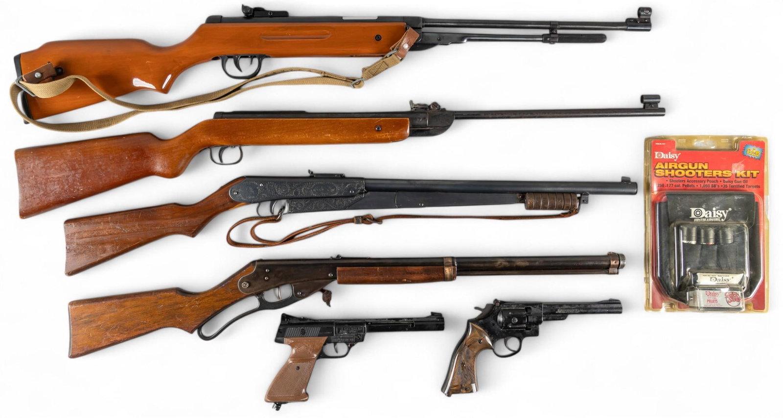 Collection of 6 BB Guns: Includes: -Crosman Powermatic BB Model 1600; w/ manual; appears functional; no CO2 cannister -Chinese BAM Tytan B3-3 .22 pellet rifle; w/ Chinese sling; mechanically functional; good condition -German