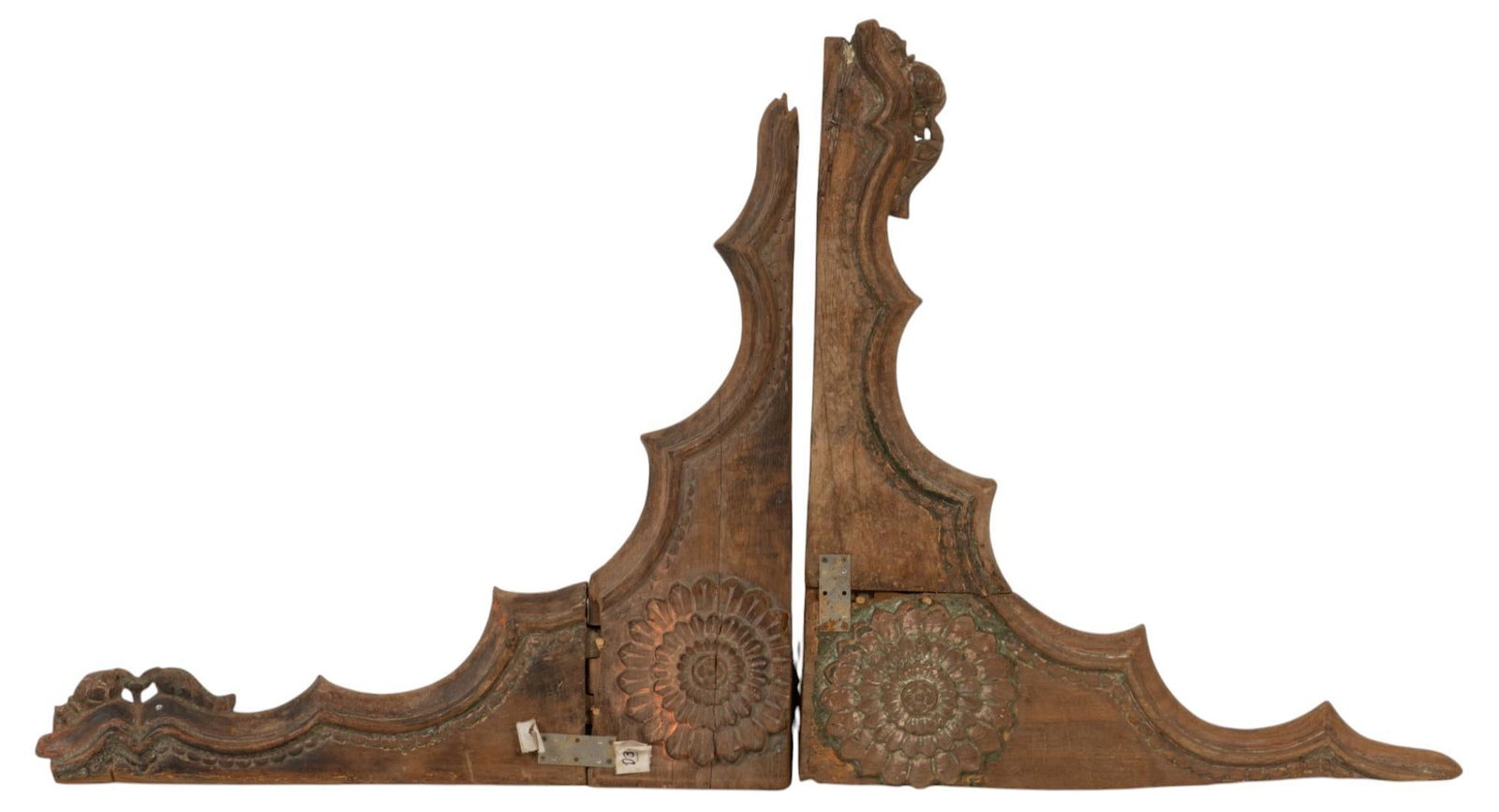 Pair of Carved Teak Corbels: Pair of carved teak corbels, featuring floral motif height 32 in. x width 34 in. x depth 3 in. Provenance: Property from the collection of a San Antonio, Texas gentleman