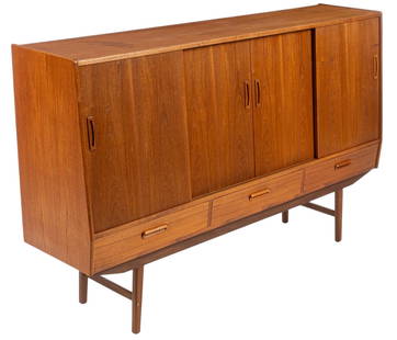 Danish Mid-Century Cocktail Cabinet: Danish mid-century cocktail cabinet featuring four sliding doors with integrated pulls, that open in the middle to mirrored back with small curved shelf, above three green felt-lined trays, flanked