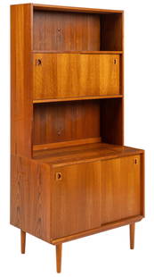 Danish Mid-Century Bookcase: Danish mid-century bookcase with open tier shelf above pair of sliding doors with integrated wooden pulls above lower cabinet with pair of sliding doors that open to interior with single bookshelf,