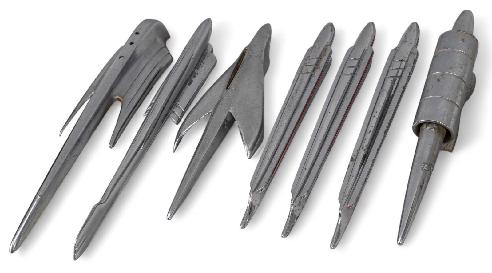 Collection of (7) Chrome Hood Ornaments: Collection of seven chrome hood ornaments, in various forms, circa 1950s height 15.25 in. x width 3.5 in. x depth 2.5 in. Provenance: Property from the collection of a San Antonio, Texas gentleman