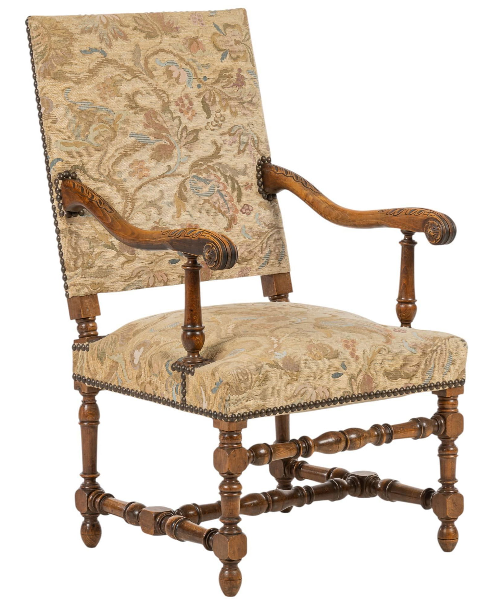 Upholstered Armchair: Wooden armchair with upholstered seat and back cushions, having scrolled armrest, and supported on twisted barley legs, with H-frame stretcher height 43 in. x width 25 in. x depth 26 in.