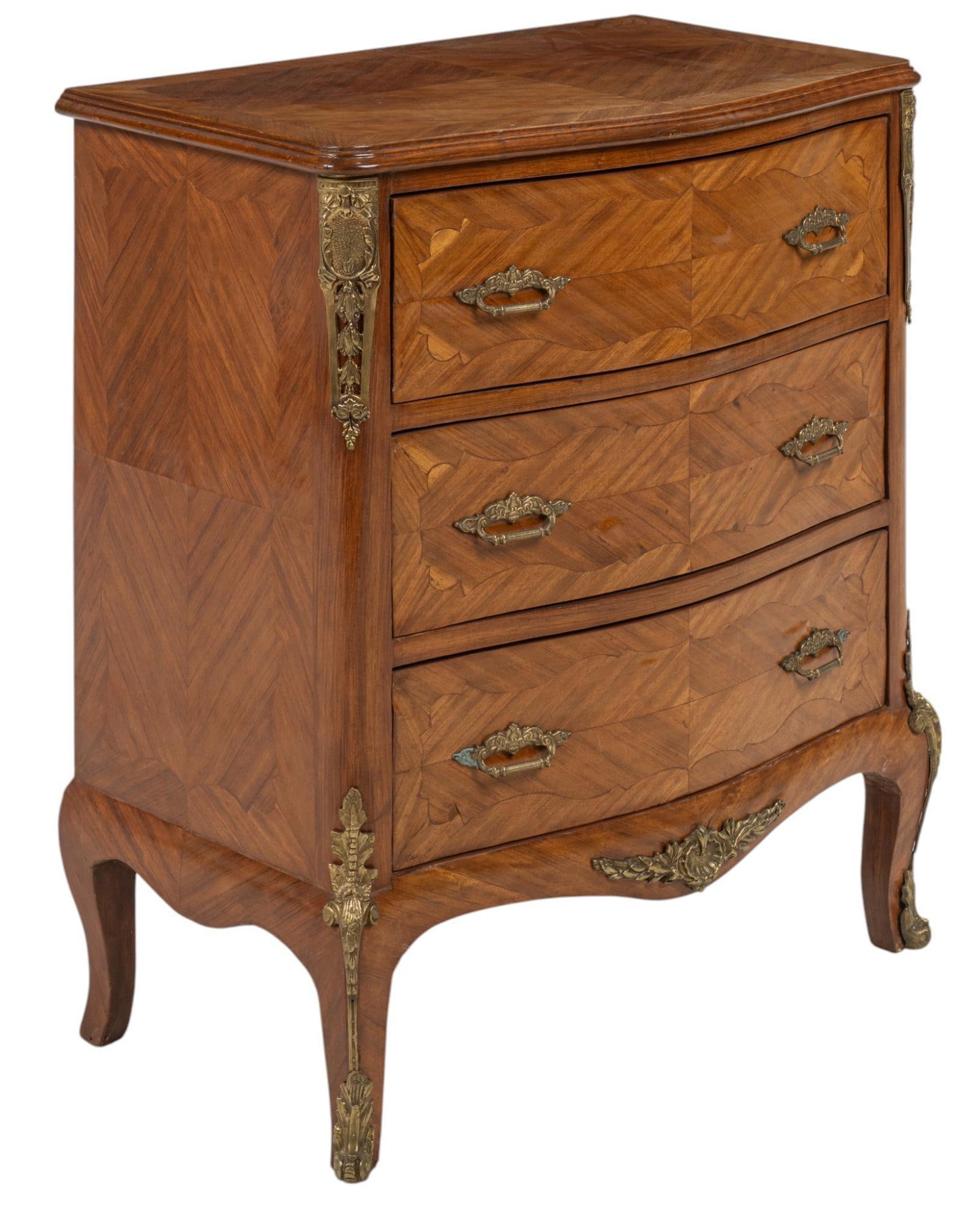 Ormolu Dresser: Ormolu dresser, with three drawers, each having two gold-toned brass pulls, on cabriole legs height 33.5 in. x width 28.5 in. x depth 17.5 in. Provenance: Property from the collection of a Boerne, Tex